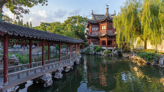 Tingtao Tower and a covered walkway beside the pond in Yu Garden – yu garden shanghai
